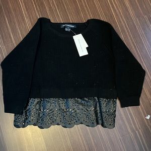 Black crew neck sweater with eyelet detail